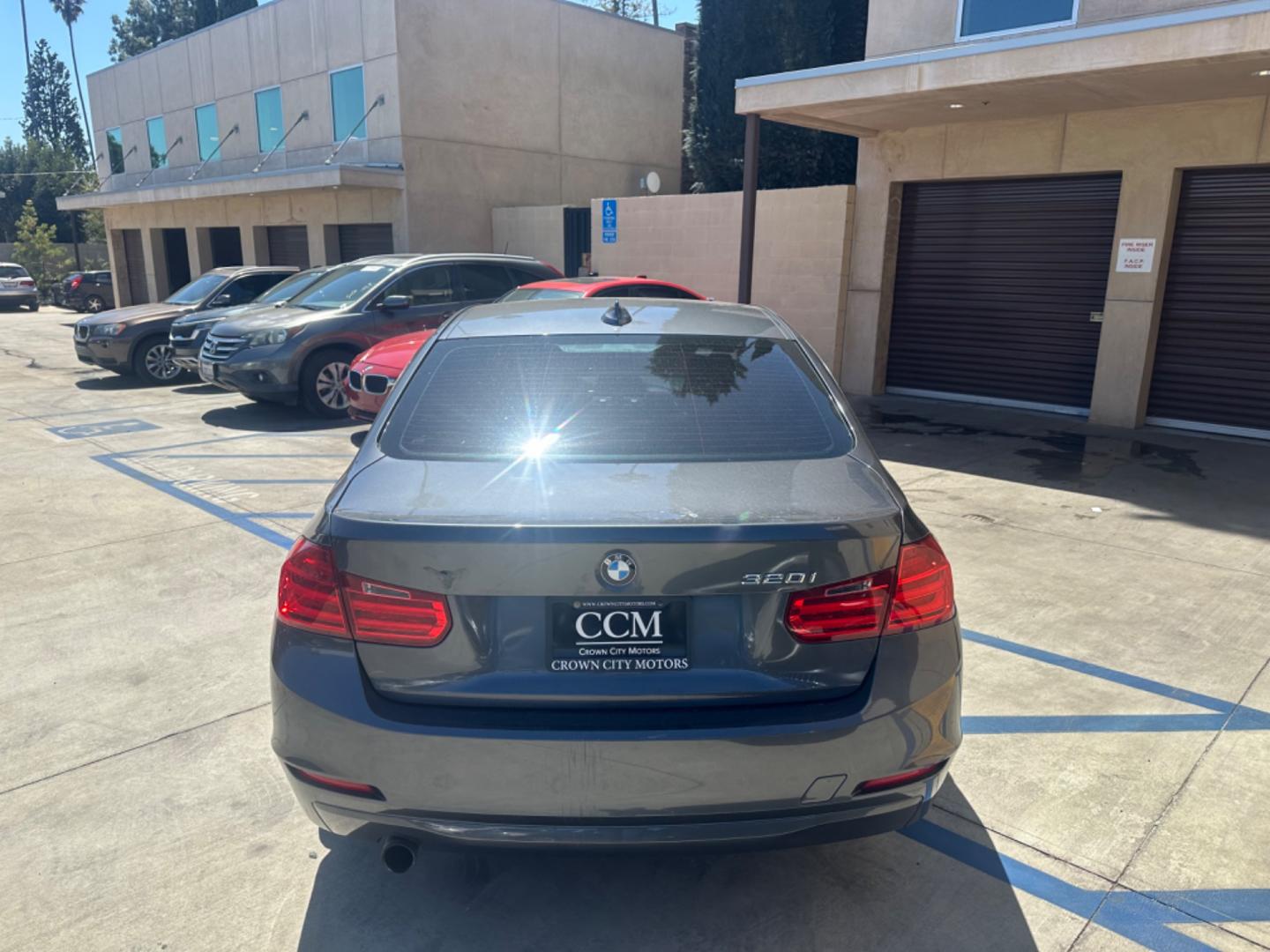 2014 Gray /Black BMW 3-Series leather (WBA3B1C52EK) with an 4 Cylinder engine, Automatic transmission, located at 30 S. Berkeley Avenue, Pasadena, CA, 91107, (626) 248-7567, 34.145447, -118.109398 - Moon-roof! Premium package! this 2014 BMW 3-Series 320i Sedan looks and drives well. Looking for a reliable and stylish vehicle in Pasadena, CA? Look no further! We have this sleek 2014 BMW 3-Series 320i Sedan available at our dealership. Whether you have perfect credit or are concerned about your c - Photo#4